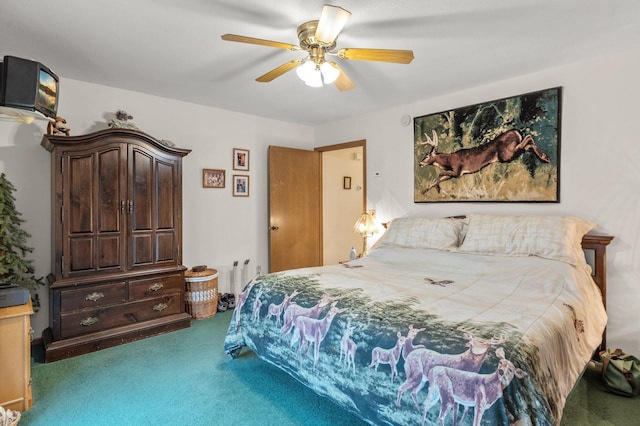 bedroom with ceiling fan and carpet