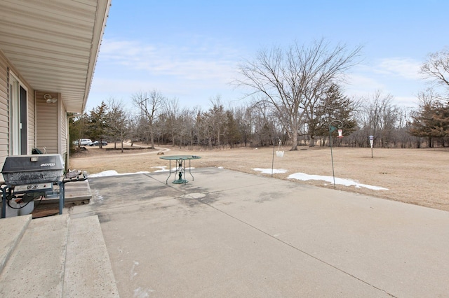 view of patio with a grill