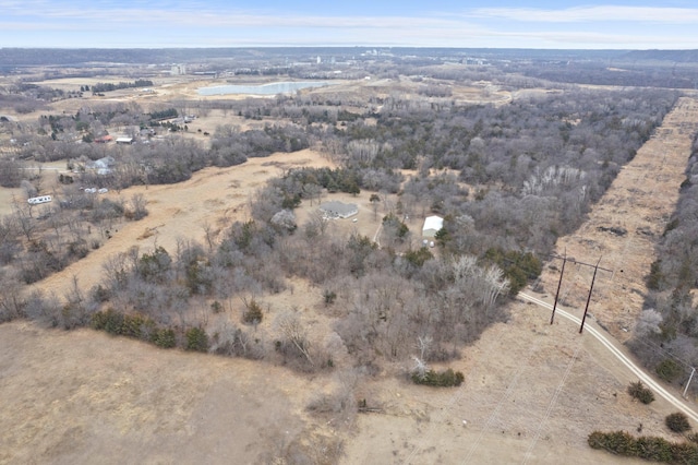 birds eye view of property featuring a rural view