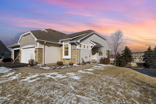 view of front of property with a garage