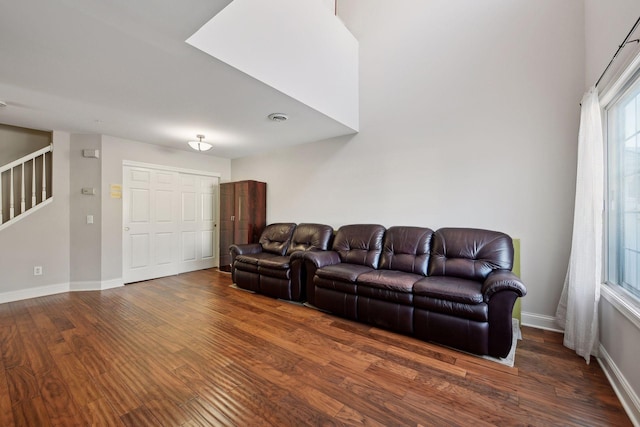 living room featuring dark hardwood / wood-style floors