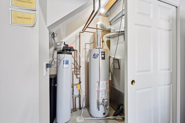 utility room featuring gas water heater