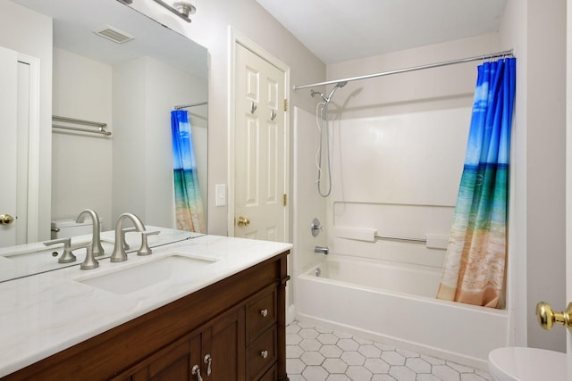 full bathroom with vanity, toilet, and shower / bath combo with shower curtain