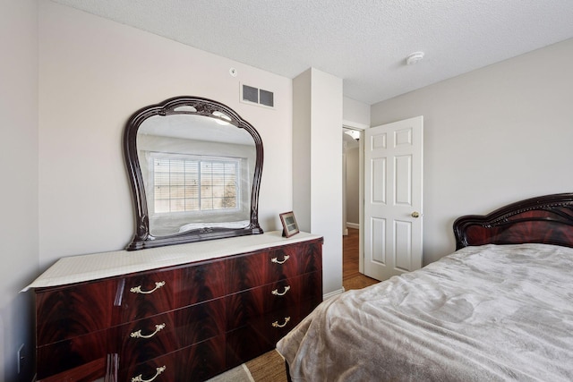 bedroom with a textured ceiling