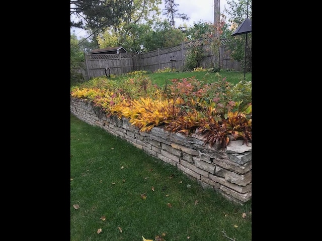 view of yard featuring fence