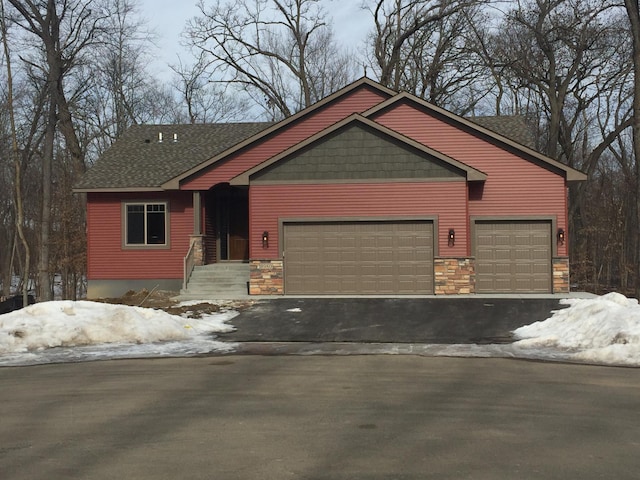 view of front of home with a garage