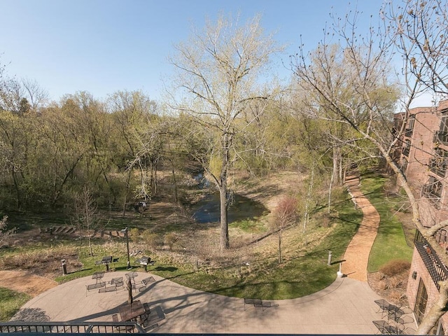 surrounding community featuring a patio area