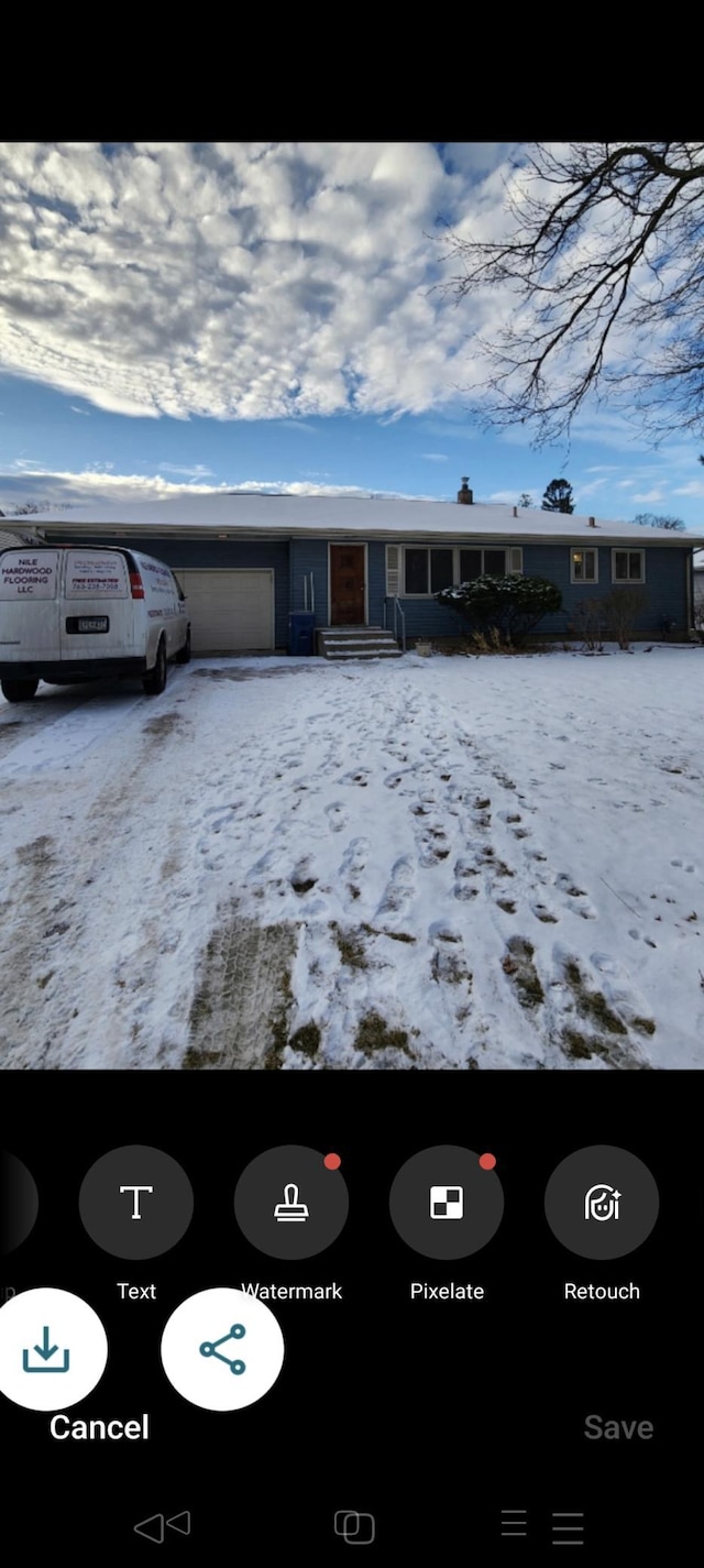 view of front of property featuring a garage