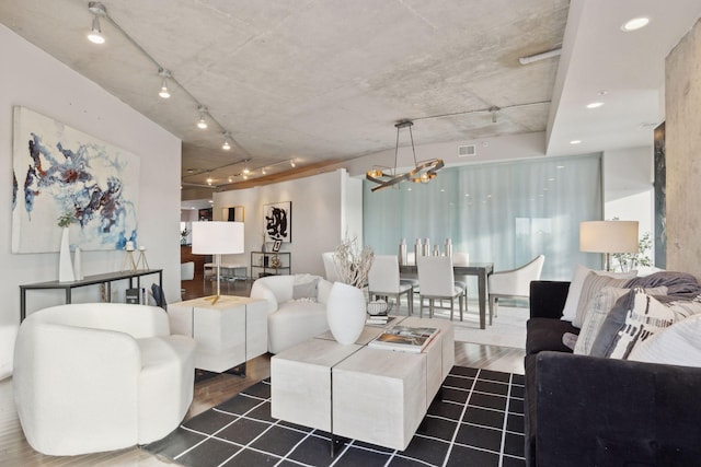 living room featuring a chandelier