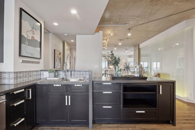 bar with sink, beverage cooler, and hardwood / wood-style floors