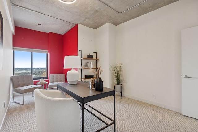 home office featuring light colored carpet