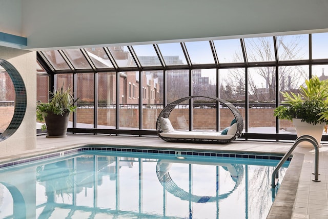 view of pool with a lanai