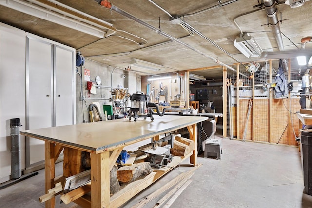 basement with a workshop area