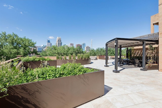 view of patio featuring a pergola and a gazebo