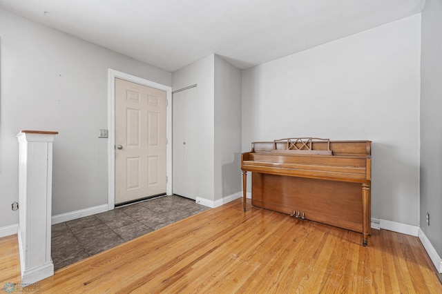 foyer entrance with hardwood / wood-style flooring