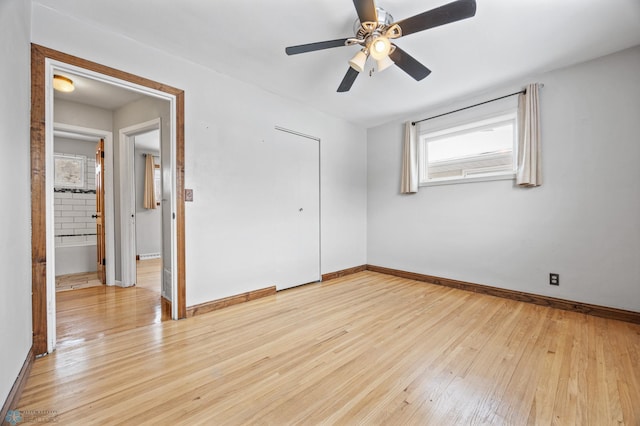 unfurnished bedroom featuring light wood-type flooring, ceiling fan, and a closet