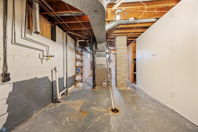 basement featuring heating unit