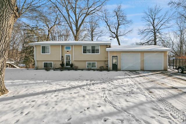 bi-level home featuring a garage