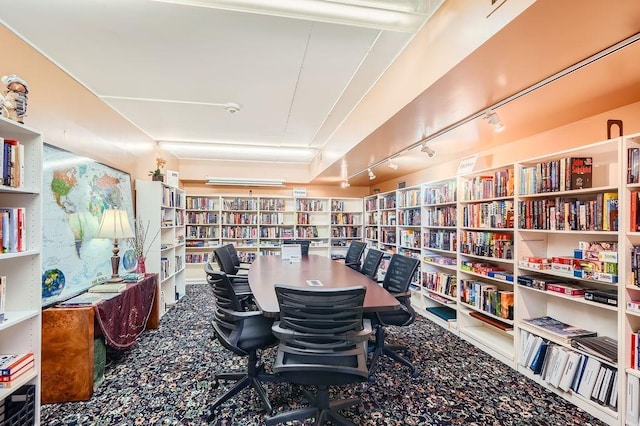 home office featuring track lighting