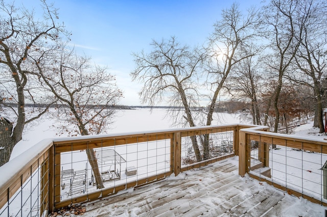 view of snow covered deck