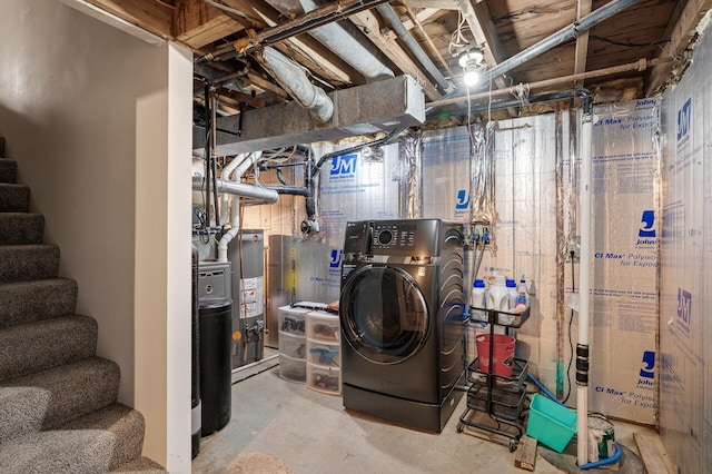 basement with washer / dryer and water heater