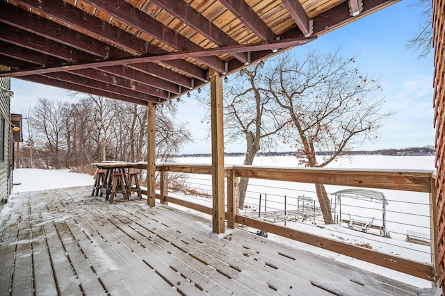 view of snow covered deck