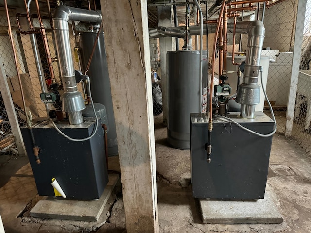 utility room featuring gas water heater