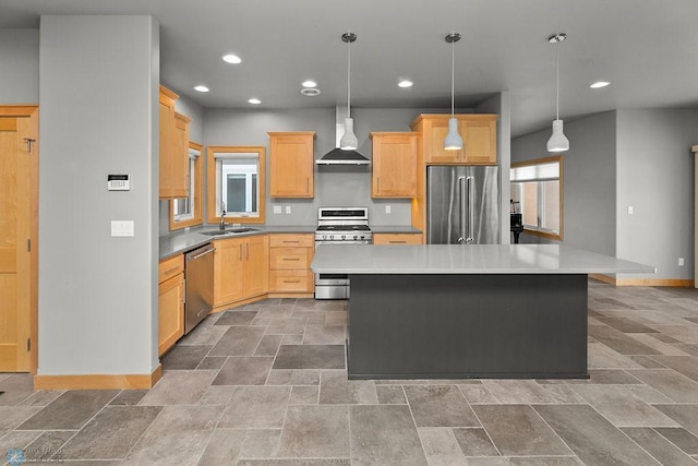 kitchen featuring pendant lighting, wall chimney range hood, stainless steel appliances, a center island, and light brown cabinetry