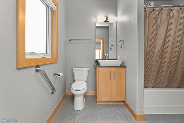 full bathroom featuring vanity, shower / tub combo with curtain, and toilet