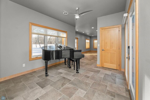 1336 Goldenwood Dr, West Fargo, ND 58078 - foyer entrance featuring baseboards, stone tile flooring, a ceiling fan, and recessed lighting