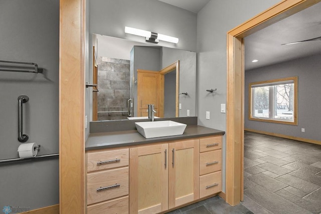 1336 Goldenwood Dr, West Fargo, ND 58078 - bathroom featuring vanity, baseboards, and an enclosed shower