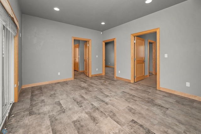 1336 Goldenwood Dr, West Fargo, ND 58078 - unfurnished bedroom with baseboards, recessed lighting, and wood finished floors