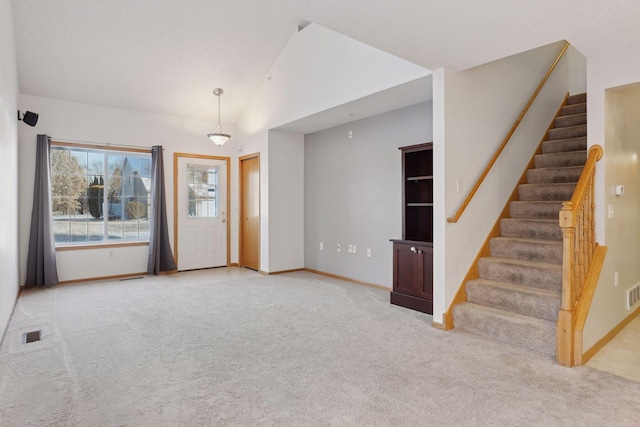 interior space with vaulted ceiling