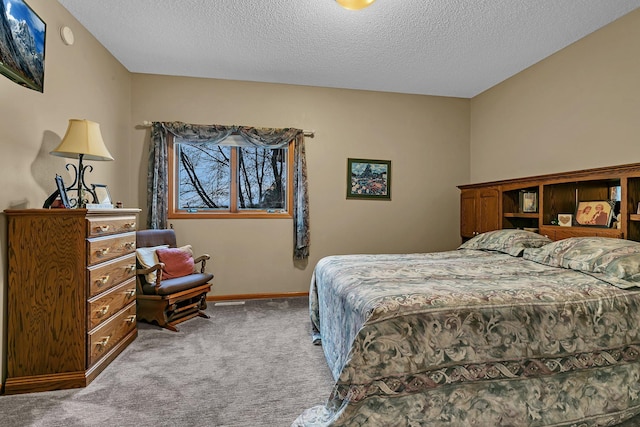 carpeted bedroom with a textured ceiling