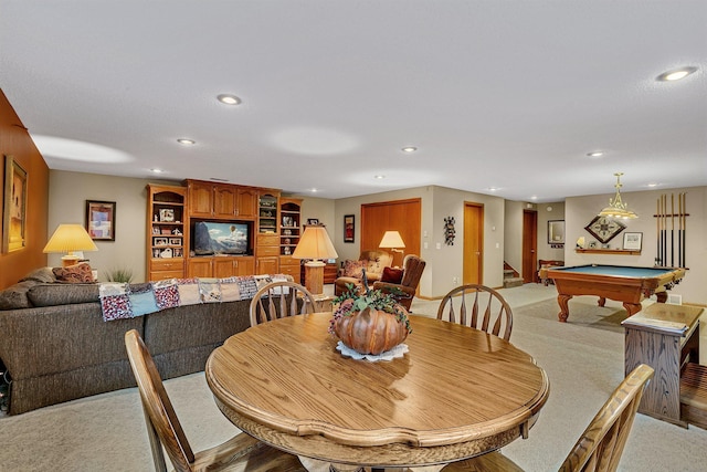 carpeted dining room with billiards