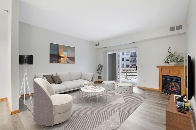 living room featuring light wood-type flooring