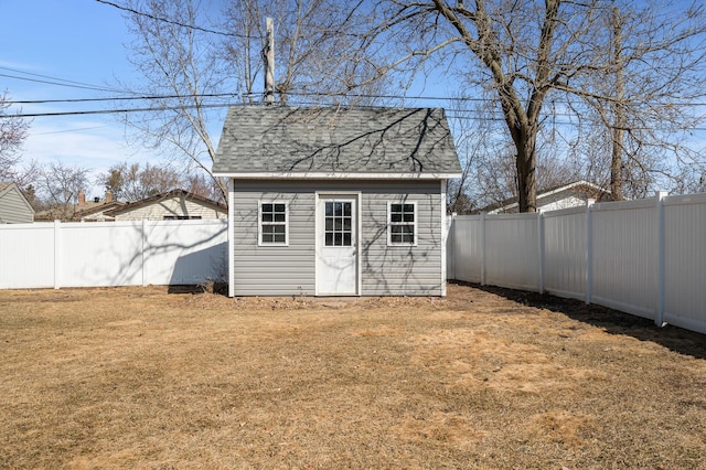 view of shed featuring a fenced backyard