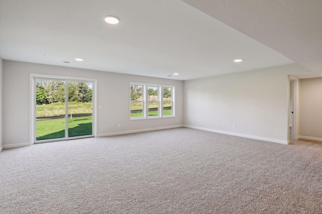 empty room featuring carpet flooring