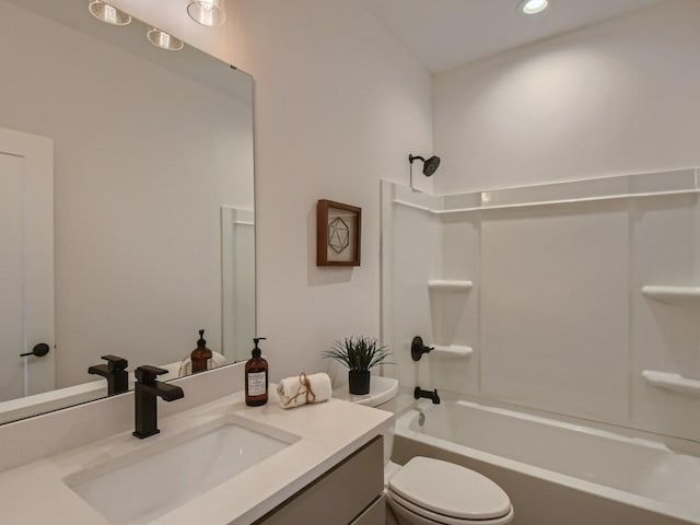 full bathroom with vanity, shower / washtub combination, and toilet