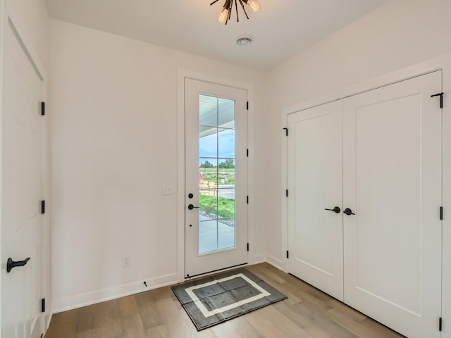 doorway featuring light wood-type flooring