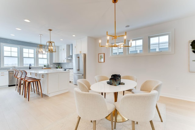 dining room featuring light hardwood / wood-style flooring