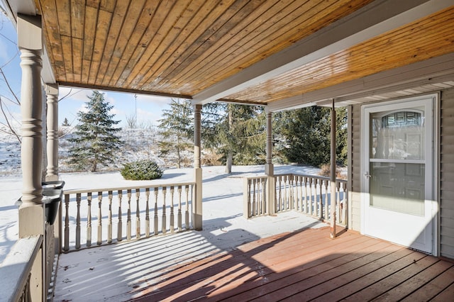 view of snow covered deck