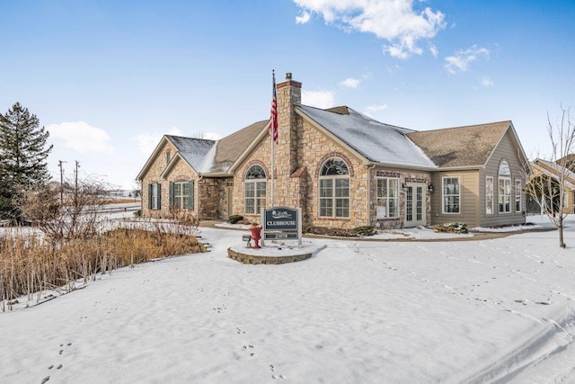 view of snow covered property