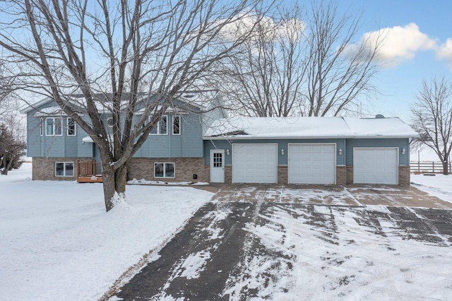 split level home with a garage