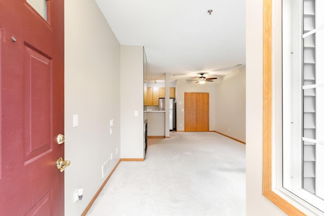 interior space featuring ceiling fan