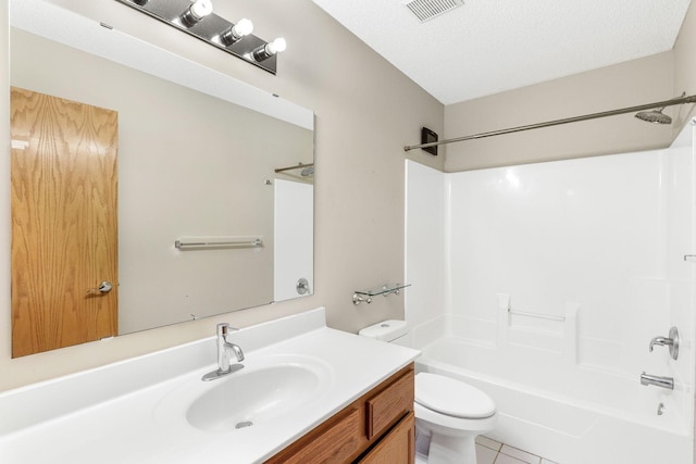 full bathroom with toilet, a textured ceiling, tile patterned flooring, tub / shower combination, and vanity