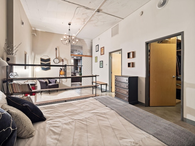 bedroom featuring a notable chandelier