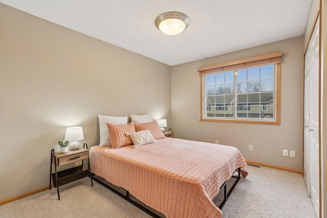 bedroom with light colored carpet