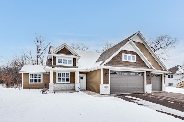 craftsman-style home featuring a garage