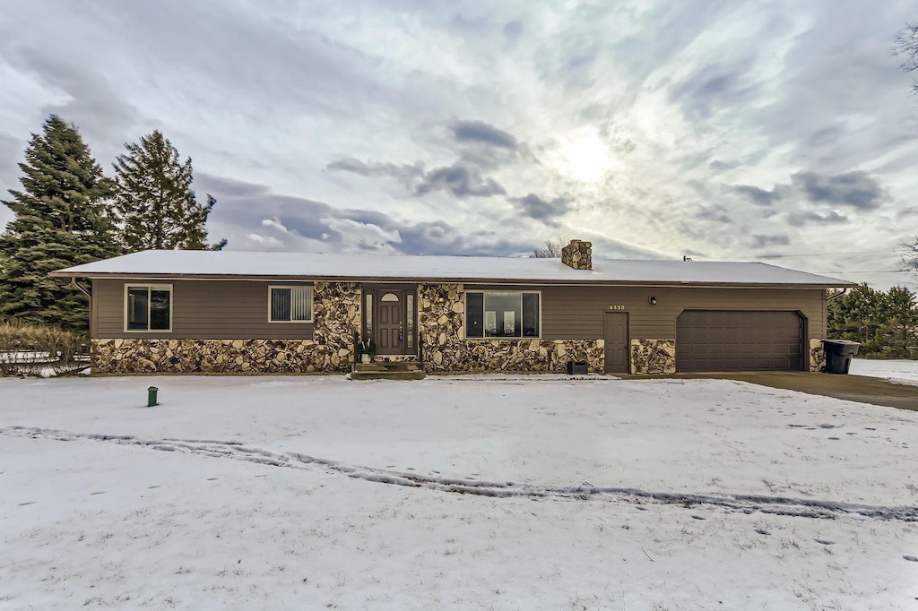 ranch-style house with a garage